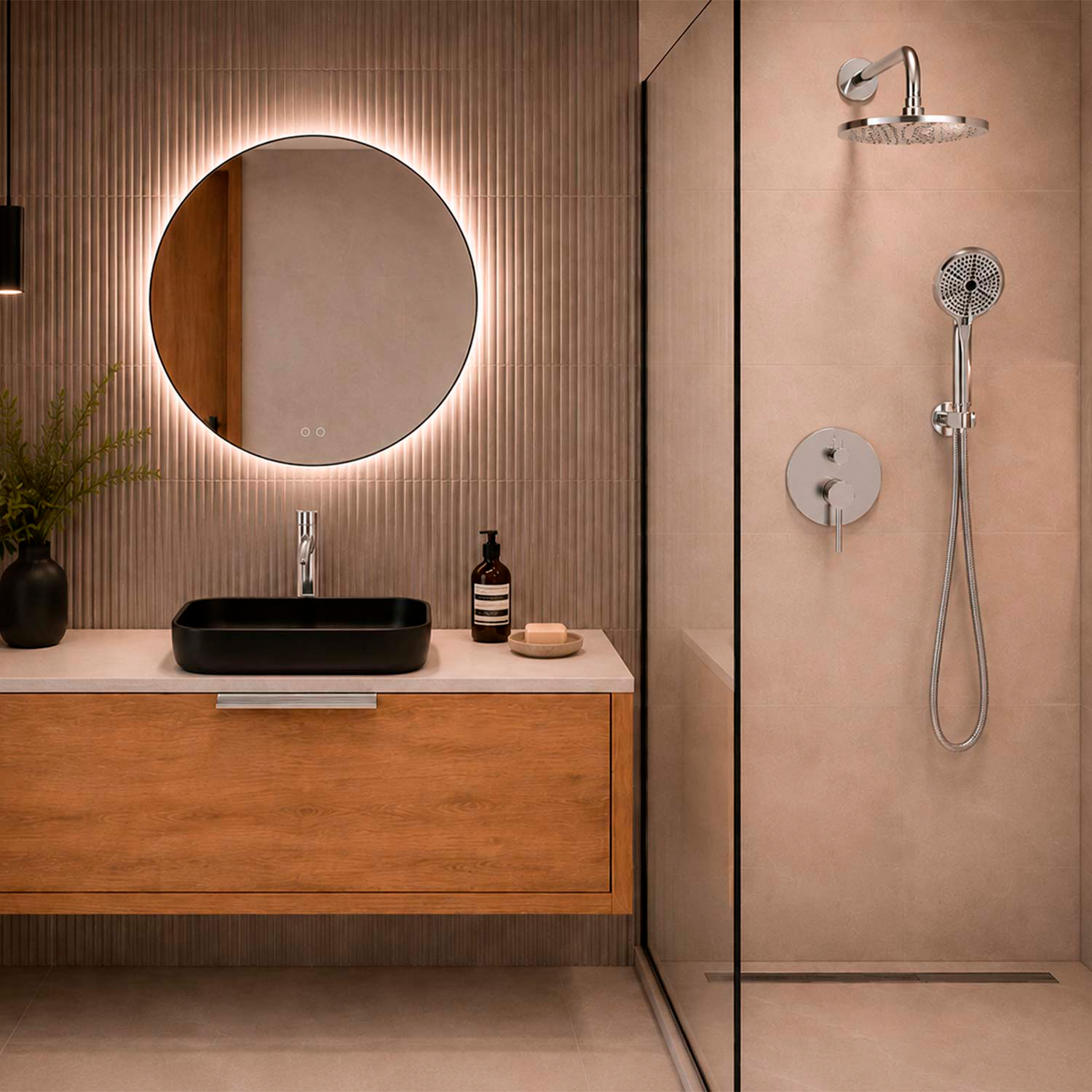 Modern bathroom interior featuring a floating wooden vanity with a black vessel sink, a round backlit mirror, and a glass-enclosed shower area with matte beige fixtures.