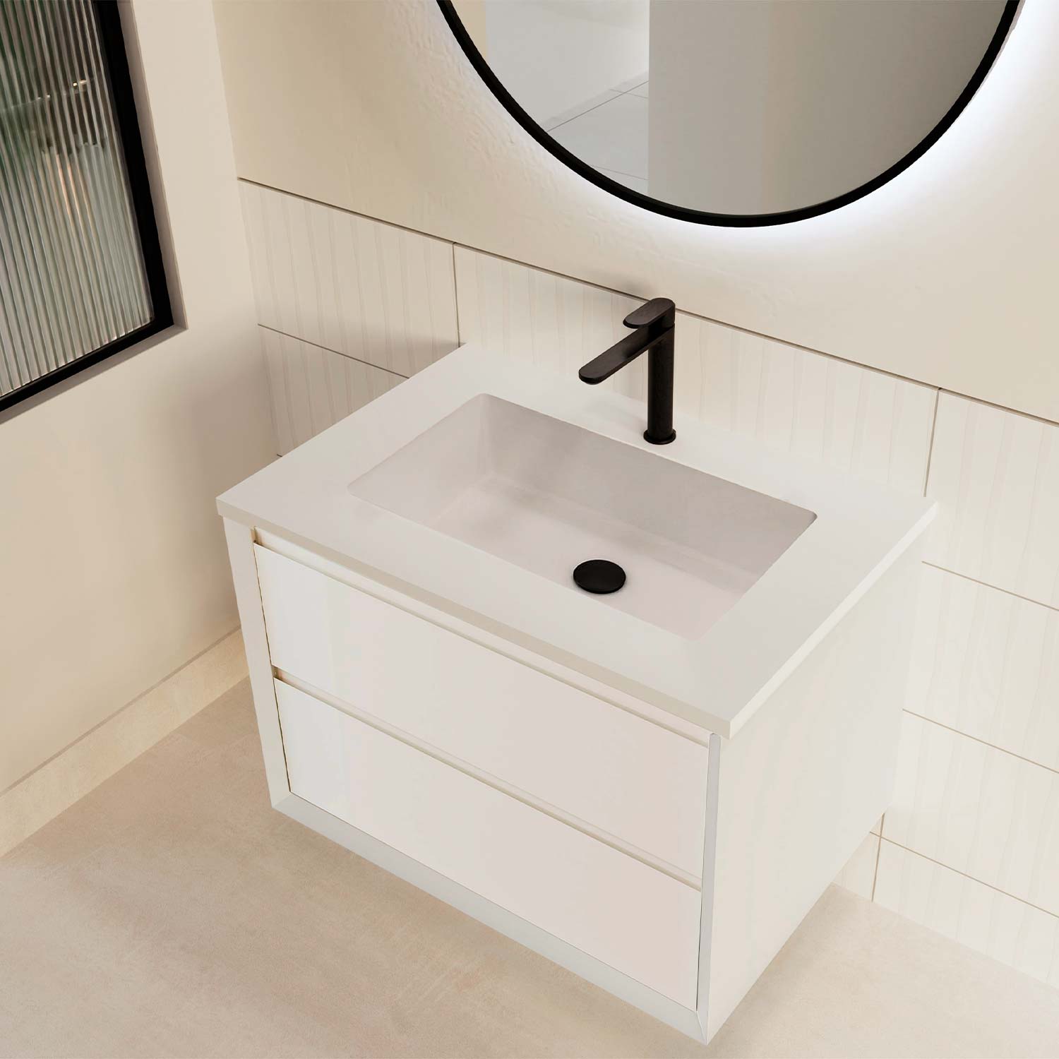 Bathroom vanity with white sink and black faucet, illuminated round mirror above.