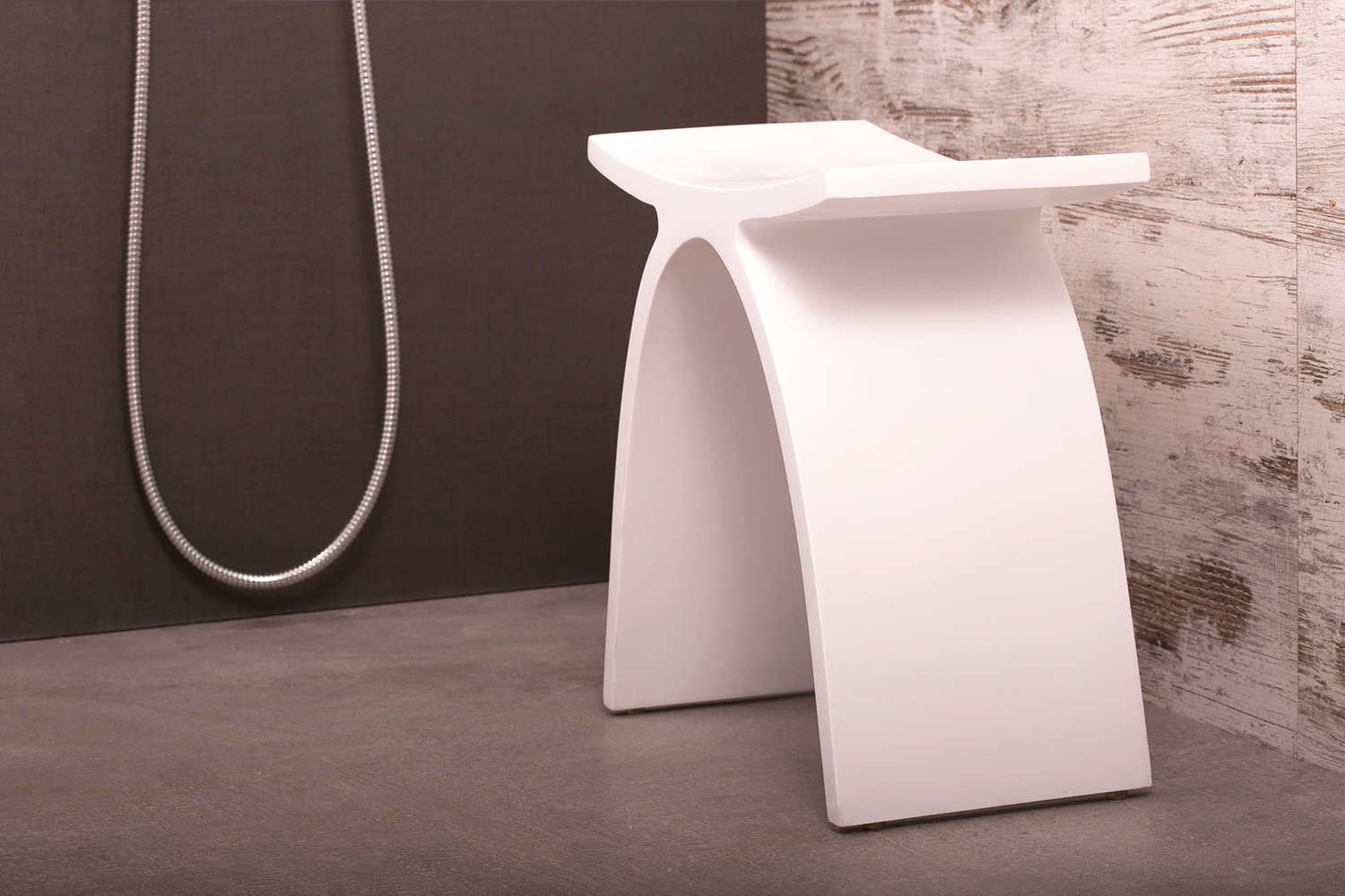 Introducing the DAX Solid Surface Bathroom Stool - a beautiful and functional addition to any bathroom! This shower or tub stool boasts a modern design and a slip-resistant feature that prioritizes safety while providing added comfort. Its solid surface material mimics the look and feel of stone, adding elegance to your bathroom without requiring any major renovations. Order now at www.daxib.com
