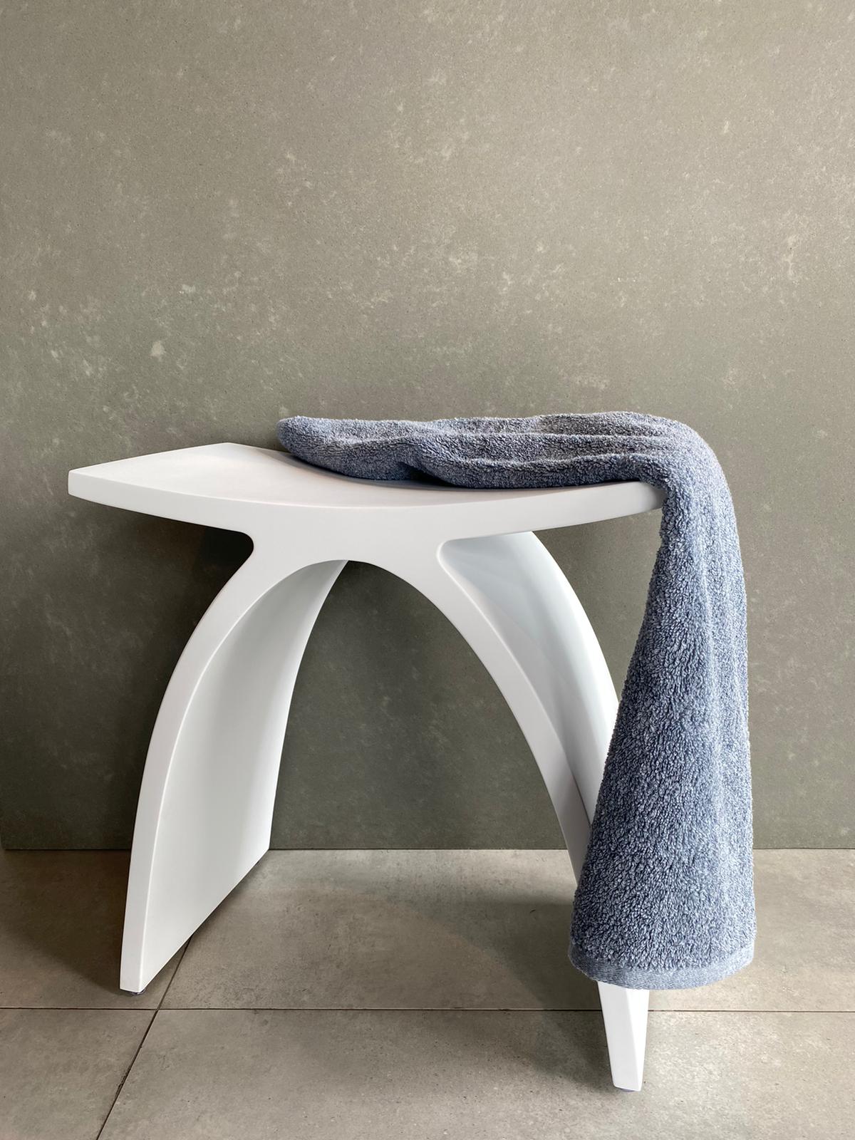 Introducing the DAX Solid Surface Bathroom Stool - a beautiful and functional addition to any bathroom! This shower or tub stool boasts a modern design and a slip-resistant feature that prioritizes safety while providing added comfort. Its solid surface material mimics the look and feel of stone, adding elegance to your bathroom without requiring any major renovations. Order now at www.daxib.com