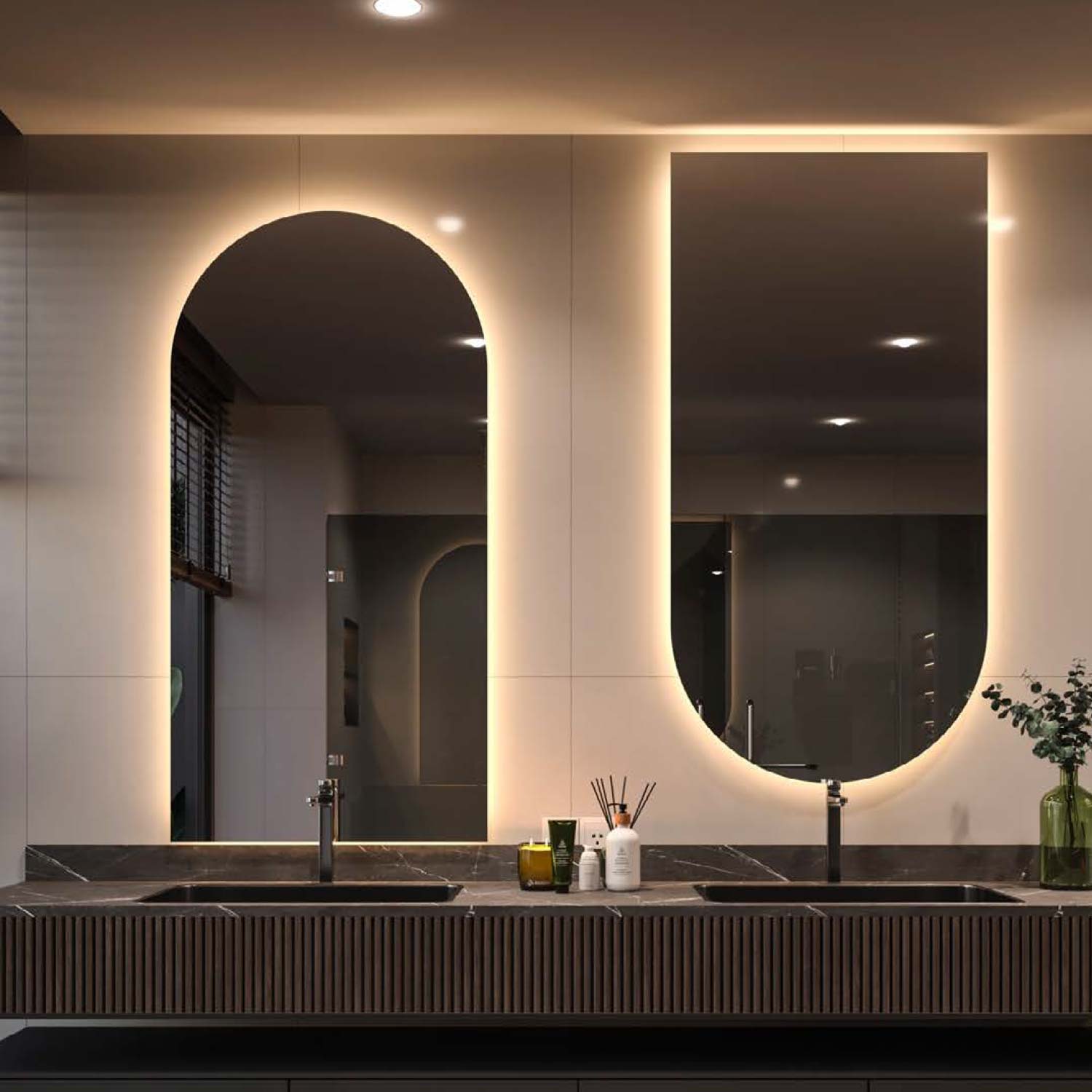 Modern bathroom vanity with large mirrors and decorative elements.