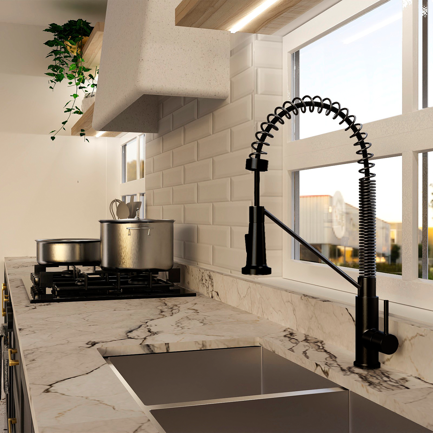 Modern kitchen with marble countertop, black faucet, and gas stove.
