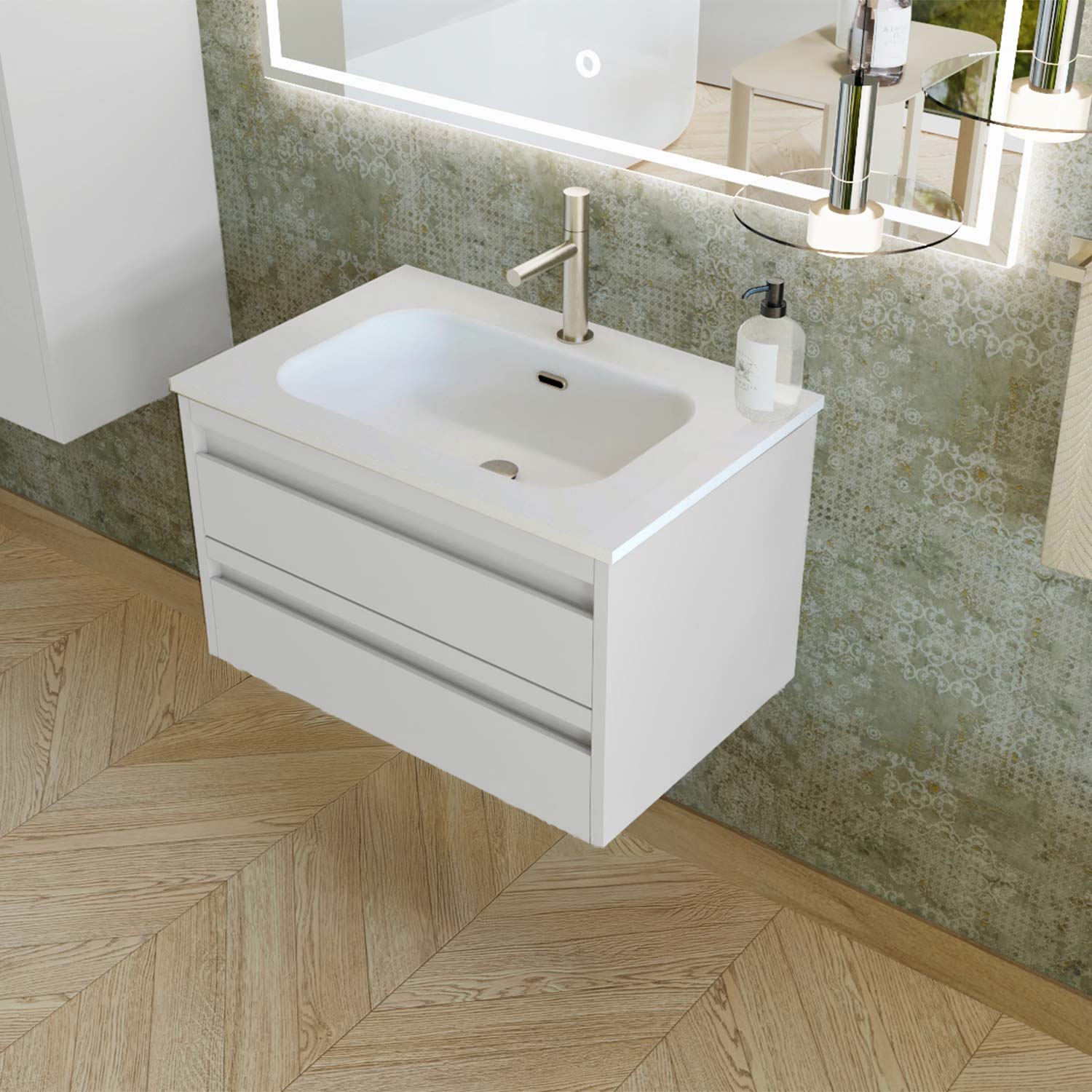 White bathroom vanity with sink against a tiled wall.