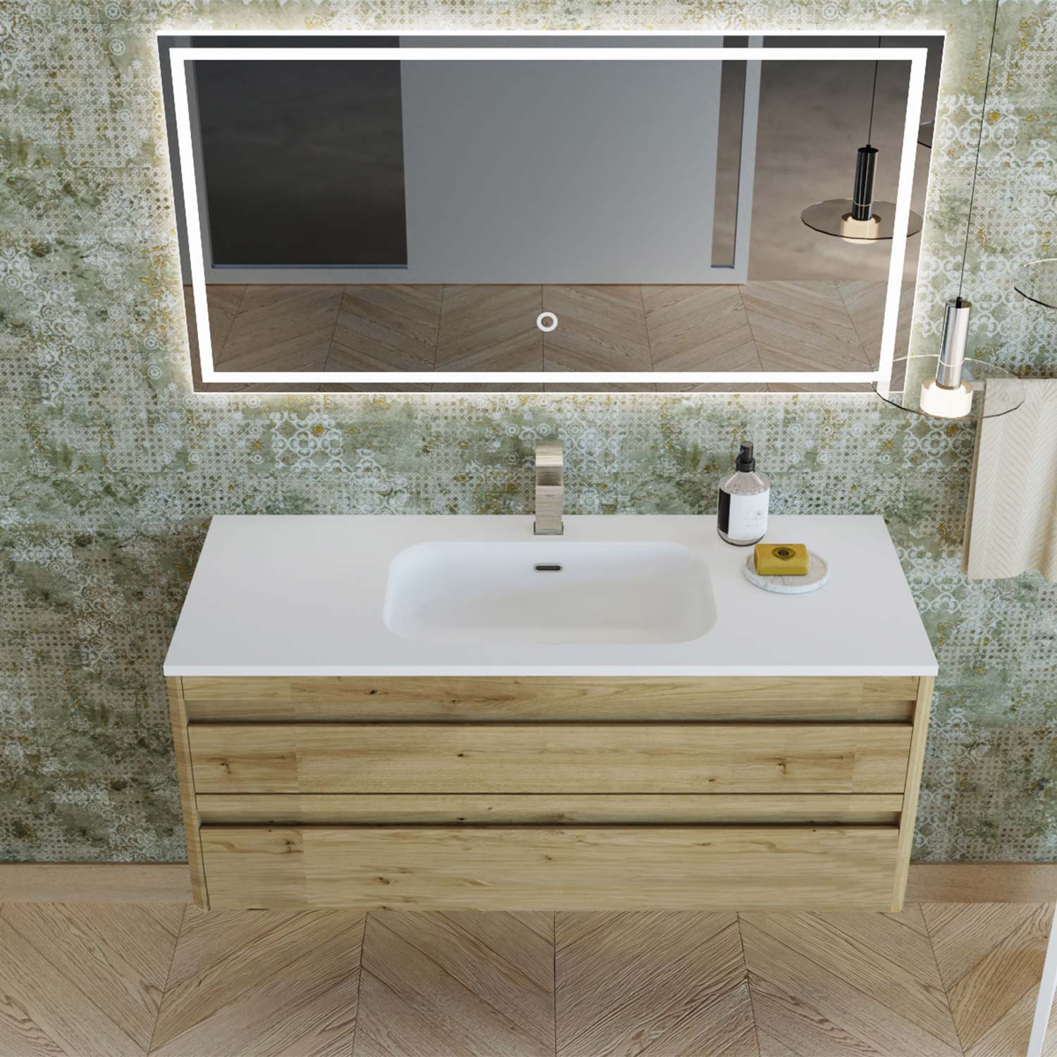 Bathroom vanity with sink and illuminated mirror against a tiled wall.
