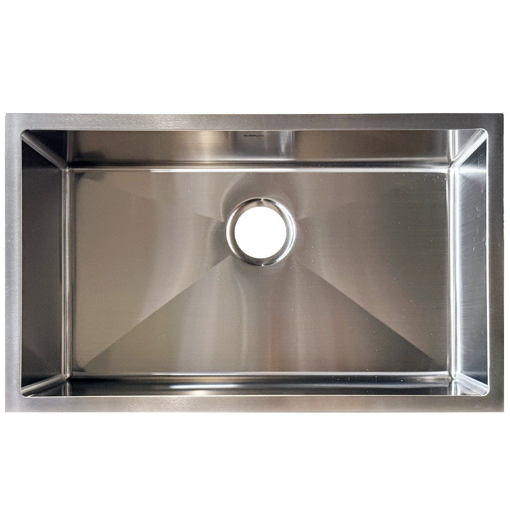 DAX Stainless Steel Undermount Single Bowl Kitchen Sink DAX-T3018-R10

Unmatched Material Quality

Crafted from premium T-304 Grade Stainless Steel, every DAX sink is built to last a lifetime. Featuring high-density 16-gauge or 18-gauge thickness, these sinks provide superior resistance to dents, scratches, and corrosion. The resilient surface is designed to withstand heavy cookware and extreme temperature changes without warping or losing its luster.