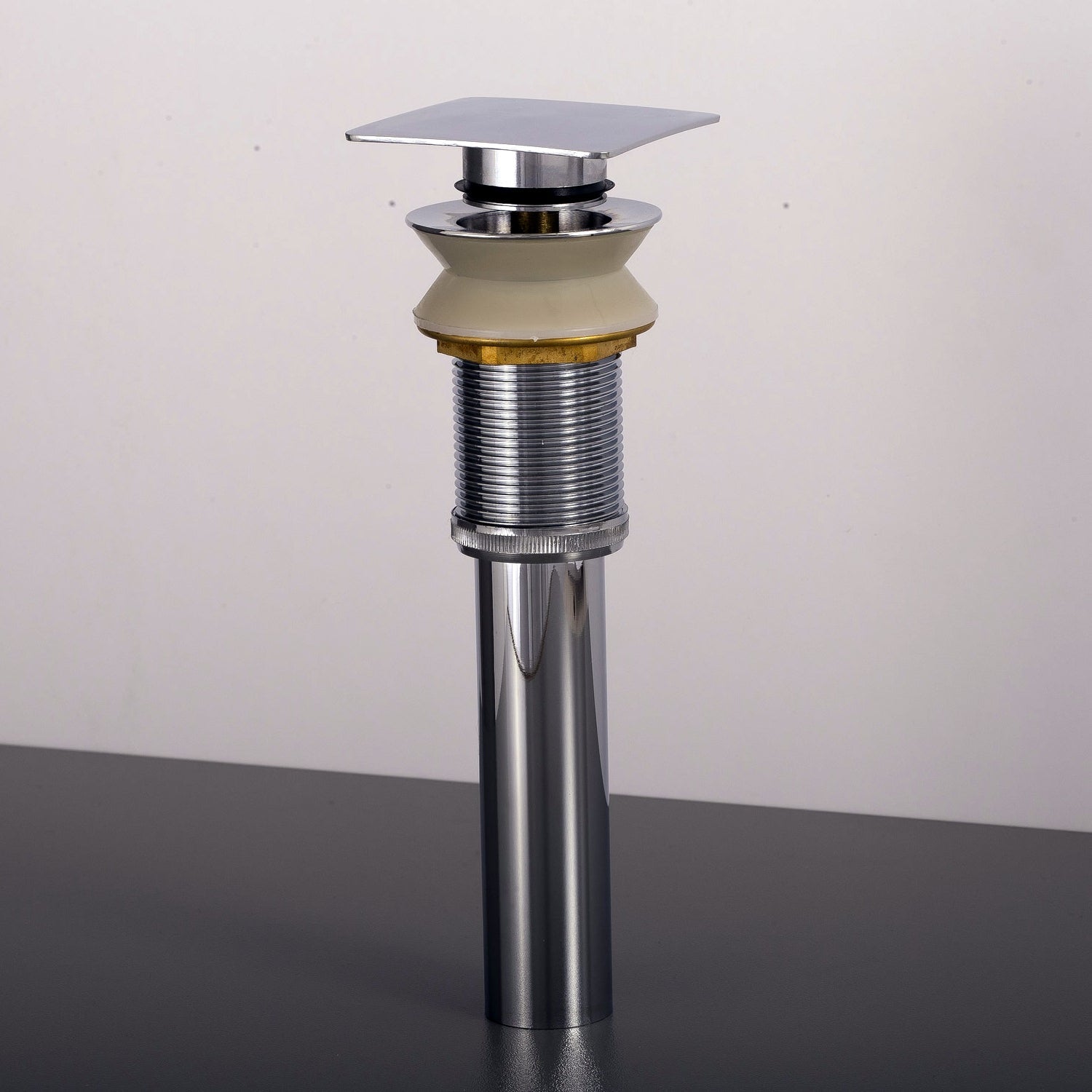 This is a DAX Square Vanity Sink Pop up Drain, Brass Body, 2-3/4 x 8-7/8 Inches. Order now at www.daxib.com