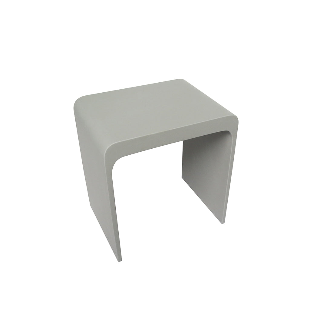 A modern white solid surface bathroom stool with a matte finish and sleek design, featuring a slip-resistant surface and handles for mobility. Order now at www.daxib.com