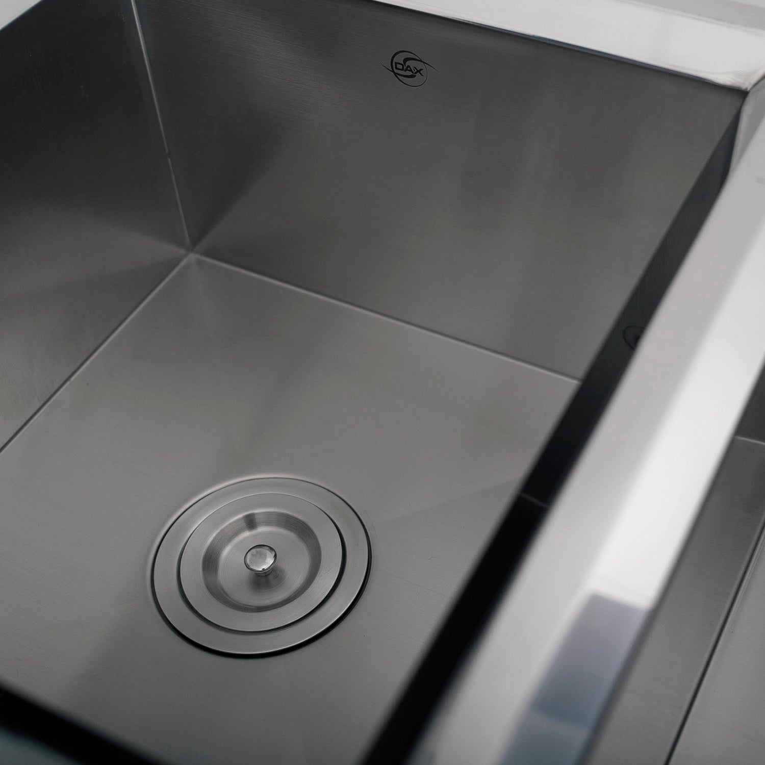 Crafted from premium T-304 Grade Stainless Steel, every DAX sink is built to last a lifetime. Featuring high-density 16-gauge or 18-gauge thickness, these sinks provide superior resistance to dents, scratches, and corrosion. The resilient surface is designed to withstand heavy cookware and extreme temperature changes without warping or losing its luster.
